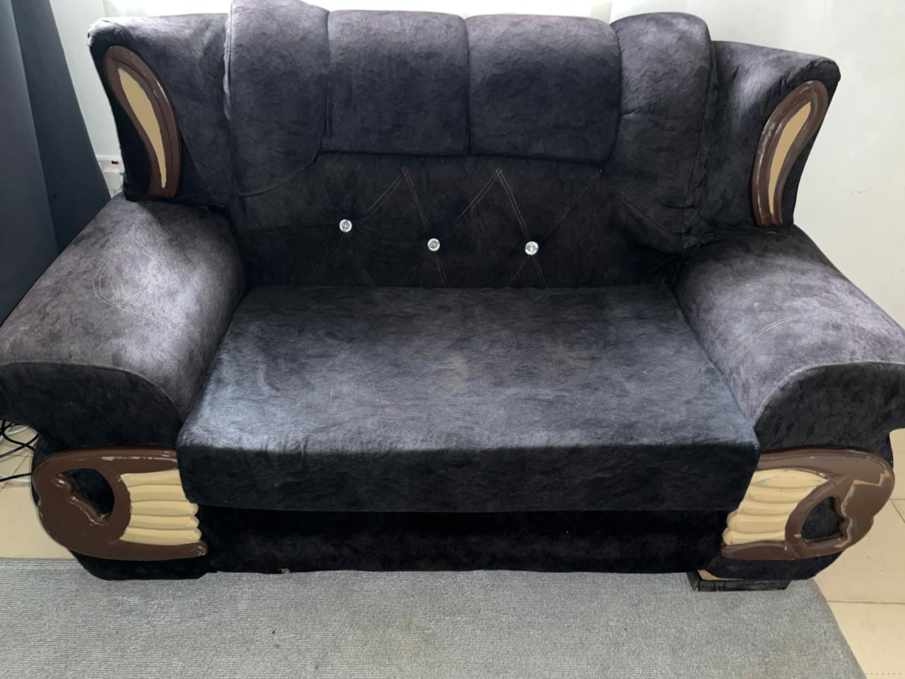 Two seater sofa+ carpet both in good condition