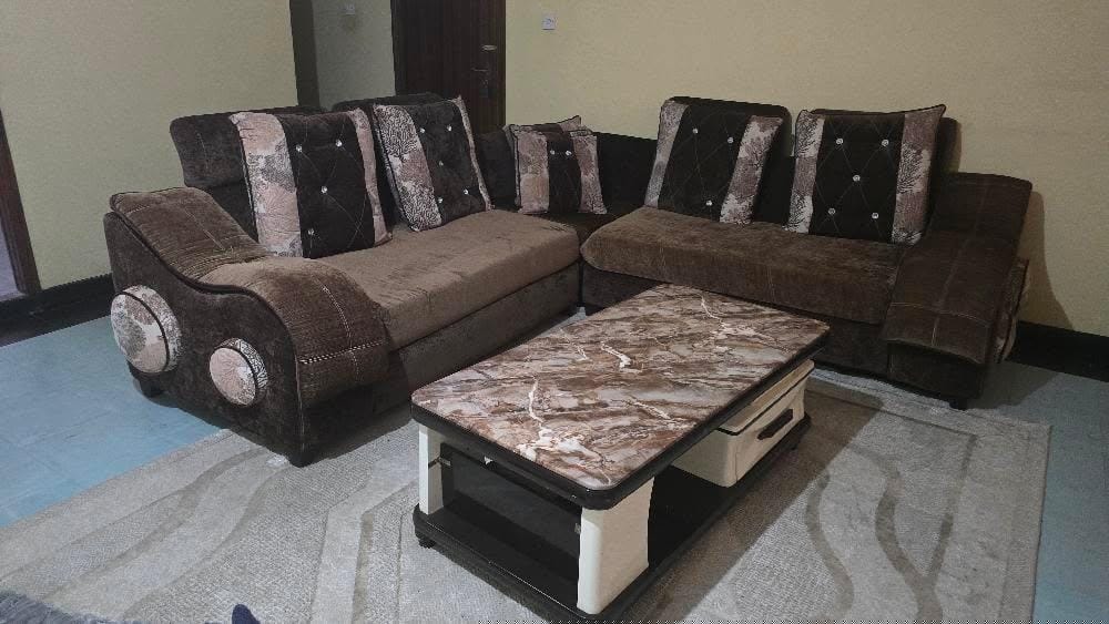 Sofa bought from Allybaba Furnishers  - Sofa is an 8 inch cushion, L-shaped 5-seater, in mint condit